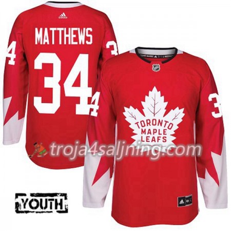Toronto Maple Leafs tröja Auston Matthews 34 Röd 2017-2018 Adidas Alternate Authentic - NHL Tröjor Barn Toronto Maple Leafs tröja Auston Matthews 34 Röd 2017-2018 Adidas Alternate Authentic - NHL Tröjor Barn